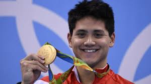 Schooling beats Phelps to win Singapore’s 1st Gold